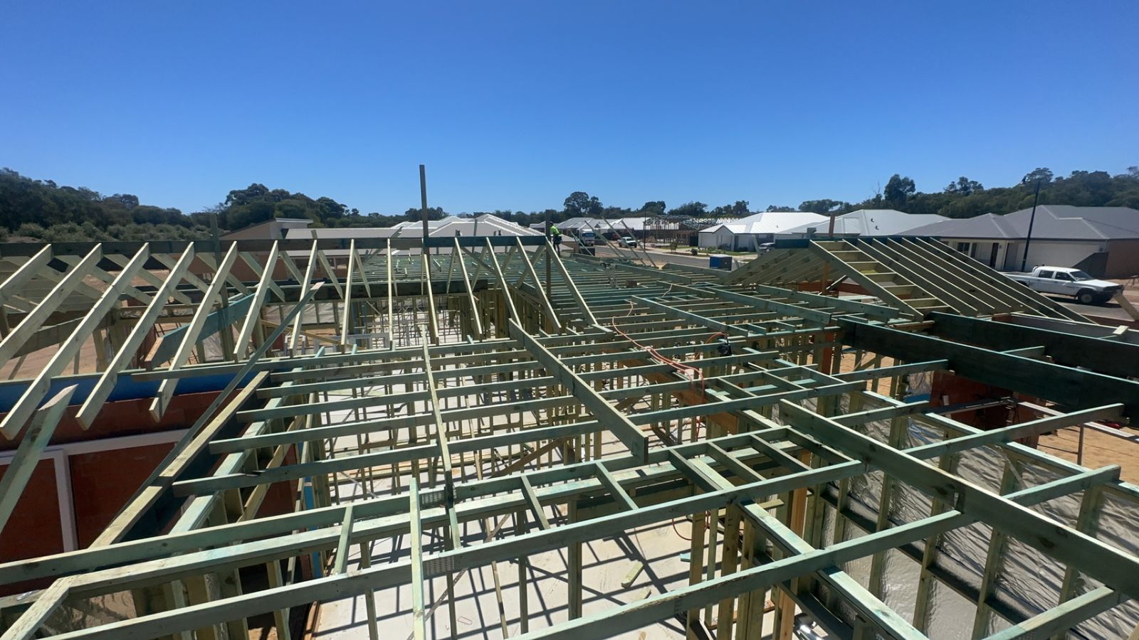 Immersive Construction roof framing on site