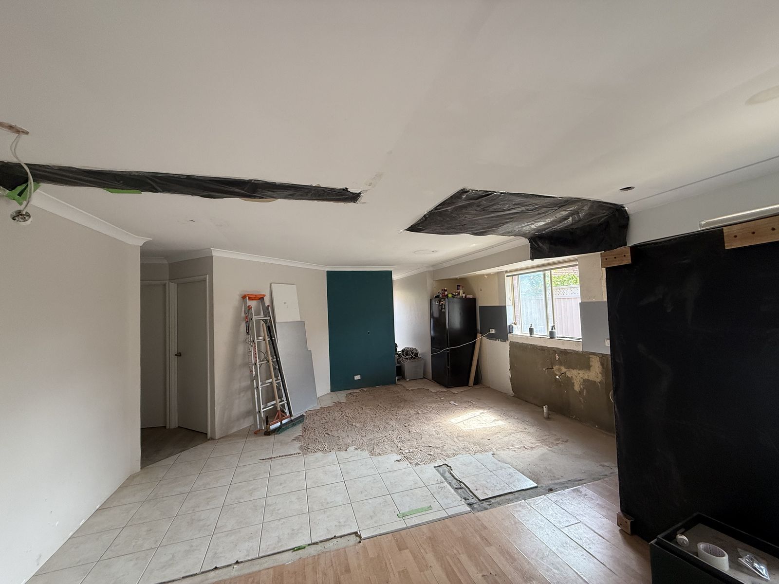 Open-plan living area after structural wall removal